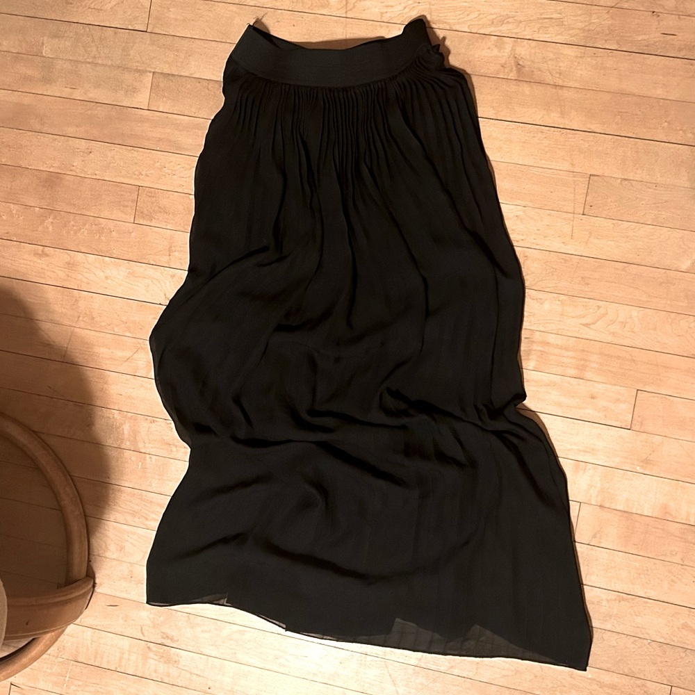 Floor-length Charlotte Russe concert-black pleated high-waisted skirt.